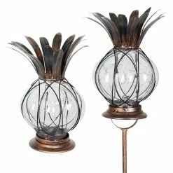 Best Pirce 🛒 Buy ⭐ Exhart Solar Pineapple Light In Bronze With 12 LED Firefly String Lights, Dual Use As Garden Stake Or Table Top Lantern ✨ 🔔